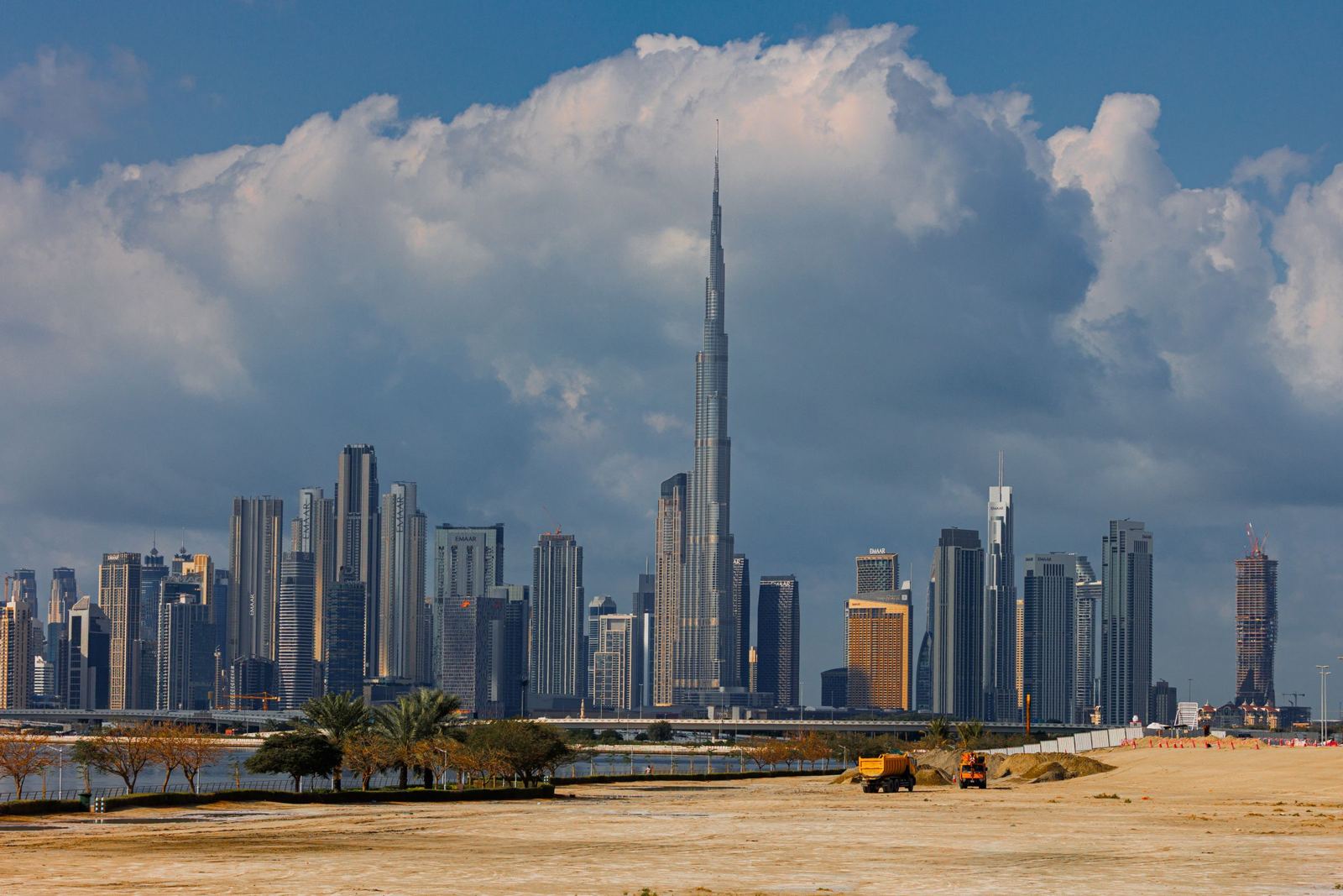 Dubai skyline with the Burj Khalifa under a blue sky