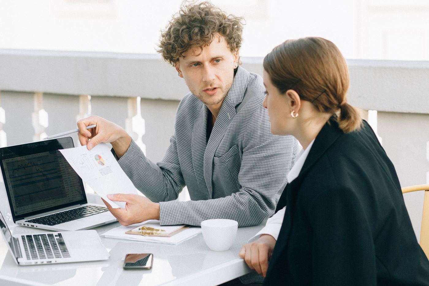 Insurance consultants reviewing a proposal